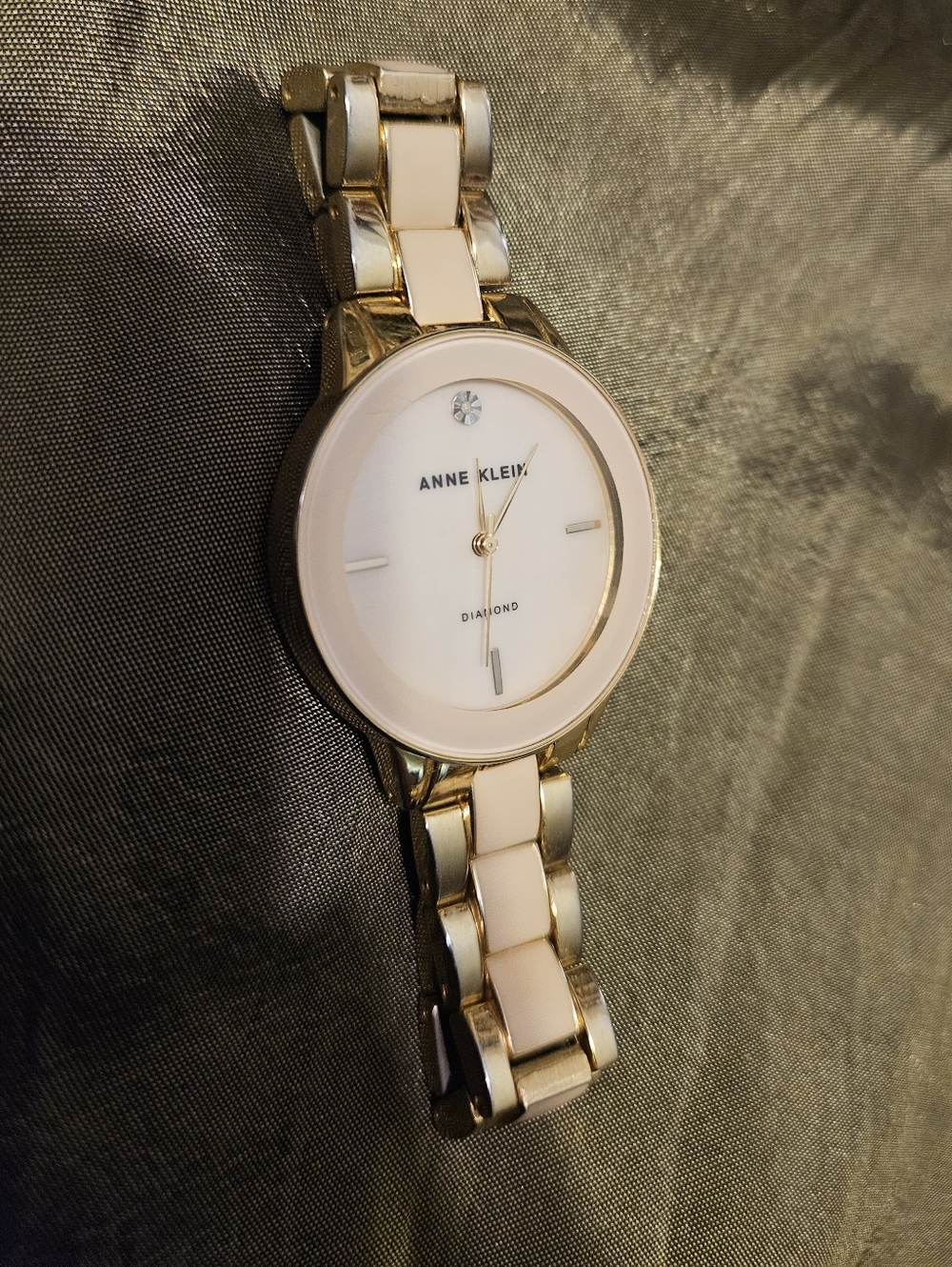 Anne Klein Women's Gold Tone and Pale Pink Bracelet Watch. Not Tested